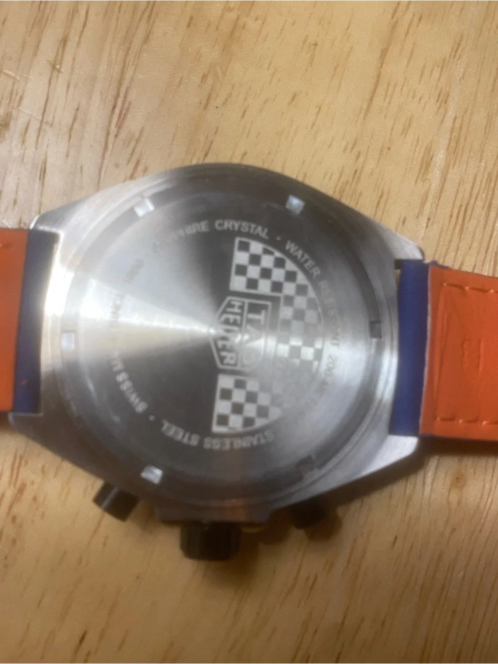 New Tag Heuer Blue Dial Watch with Orange Accents